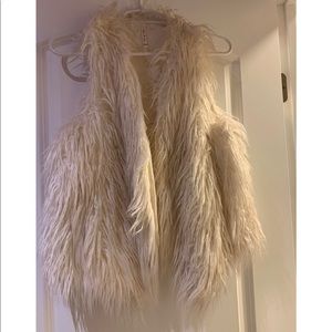 White faux fur vest
